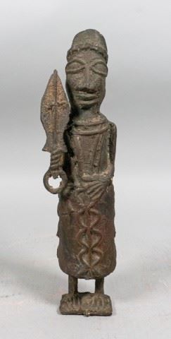 58	Benin Style Bronze Warrior Figure	Benin style bronze warrior figure. 1 1/2" L x 1 1/2" W x 11 3/4" H. Residue from age. From the collection of the Salmagundi Club.
