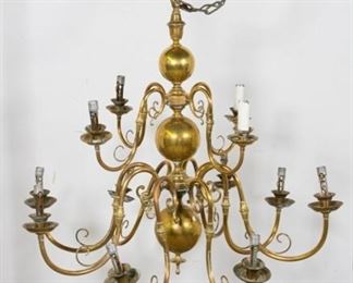 67	Brass Chandelier	12 light brass chandelier. 4 lights over 8 lights. Plastic candle holders cracked and missing. 35"L. From the collection of the Salmagundi Club.
