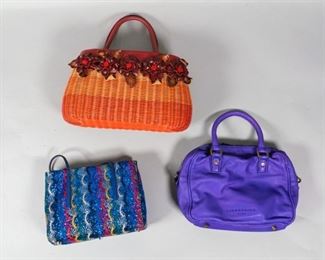 74	Collection of 3 Purses	A collection of 3 purses: A Liebeskind purple shoulder bag with original tags, detachable strap and dust bag. Wear to the handle. 12" L x 10" W. From the collection of the Salmagundi Club. A woven basket bag with leather detailing and handle, orange gradient and leather applique flowers. 7 1/2" H x 10" Diameter. An Abro blue sequined hand bag with metal feet. 7 1/4" L x 8" W.

