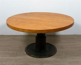 236	Barber Chair Side Table	Barber chair side table. Wooden top with metal base. 25 1/2" H X 48" Diameter (Top) - Bottom 25 1/4" Diameter
