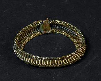 273	18K Gold Uno A Erre Bracelet	Lot includes mesh link bracelet with Italian makers mark 750 Brev, 8 1/2"L, 54.1 grams
