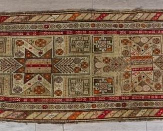 332	Caucasian Runner	Caucasian rug runner. Brown with geometric patterns. Some fraying on outside length. 7'7" x 3'3"
