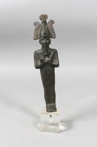349	Bronze Statuette of Osiris	Late Dynastic-Hellenistic bronze statuette of Osiris. Circa 664–31 B.C. Chipping of the material on the crown. 8" Height. 10" with stand included.
