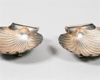 353	Pair of Buccellati Sterling Shell Dishes	Buccellati (Italy, 1919-present). Pair of sterling silver scallop form footed shell dishes. Signed Buccellati 925 on the rim. Each 3 1/4" x 3 /4", 106.7 grams total
