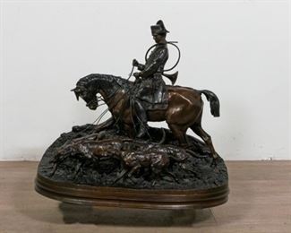 366	PJ Mene Fox Hunt Bronze Sculpture	After Pierre Jules Mene (French, 1810-1879). A hunter on horseback leading a pack of hounds. Signed on the edge: "PJ Mene 1869". 23 1/4" H x 14" W x 26 1/4" Diameter. Dirt accumulation in the reliefs.
