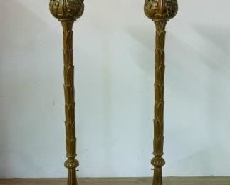 372	Pair of Neoclassical Torchieres	Pair of Neoclassical torchieres. Early 20th Century. Carved oak, scallop base, acanthus leaf columns, curving floral light recess. Torchiere has been tested and works. Some wear to base. 72" H x 12" D
