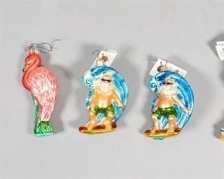 385	Christopher Radko Christmas Ornaments	Grouping includes Santa under a palm tree, 2 Santa surfing, seahorse, parrot. Largest: 6 1/2" L
