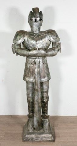 389	Stamped Tin Knight in Suit of Armor	Stamped tin knight in suit of Armor. 82"H
