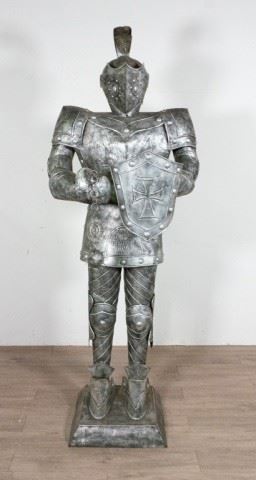 390	Stamped Tin Knight in Suit of Armor	Stamped tin knight in suit of armor. 84"H
