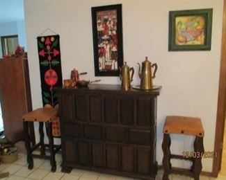 Bar/Credenza.  Shelves access from back side/sliding doors.  2 bar stools. Brass and Copper Serving pieces 