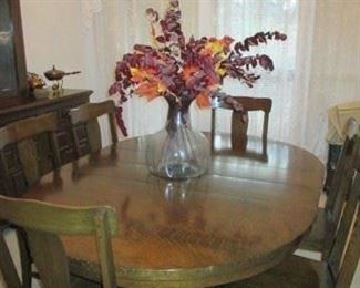 Dining table with 2 leaves.  Dark wood.  6 chairs 