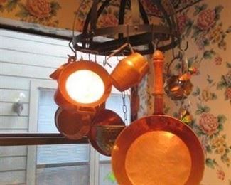 Copper pans and assorted.  Wall hanging rack.