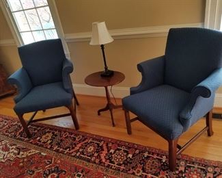 pair wood framed chairs