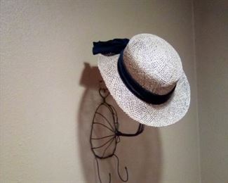 Hat and stand (sold separately)