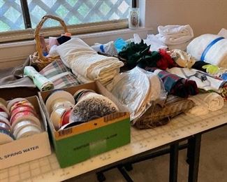 Assorted Notions, Sewing Items, Sewing Cutting Table very Versatile with Drop Leaf Sides for Storage and Wheels that Lock into Place Once Positioned Includes Cutting Mat Layout