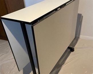 Sewing Cutting Table very Versatile with Drop Leaf Sides for Storage and Wheels that Lock into Place Once Positioned Includes Cutting Mat Layout