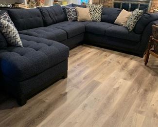 This is a great navy blue sectional couch. It has 4 different sections and can be purchased as a whole or as individual pieces.