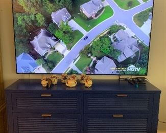 this 6 drawer chest is amazing painted navy blue.  The big screen television is not for sale.  It will move with the family to Houston.