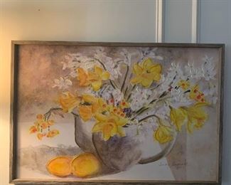 This piece of art is hanging over the old black buffet.