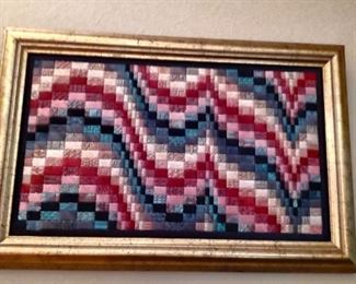 Handcrafted needlepoint.
