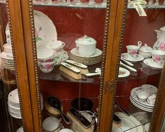 Top Shelf; French Crystal Stemware, Meissen, 6 Piece Sterling & Enamel Dresser Set (Landscape) Bottom shelf; Complete Dinner Service Spode Cobalt, Gilt & Cream