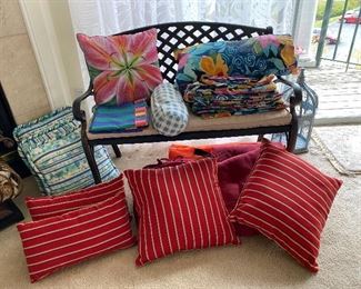 Outdoor metal bench w/seat cushion and assorted outdoor furniture covers, pillows