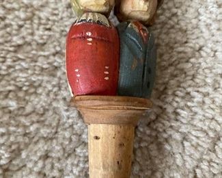 1950’s hand carved and painted mechanical bottle stopper.
Wooden handle on the back when pulled down, make necks go up and couple turns heads to kiss!