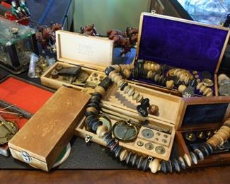 Various antique measuring tools, balance scales