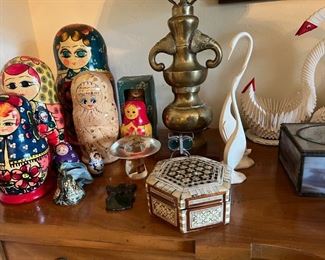 Nesting dolls and lots of boxes, paper swans