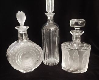 Two Vintage Lalique Crystal Decanters and one Tall Baccarat Crystal Decanter (center)