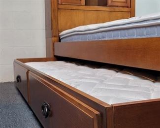twin bed with rolling trundle (mattresses sold in separate lot)