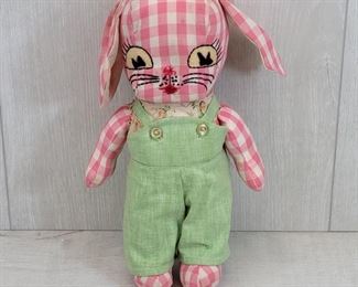 Pink antique little girl's doll