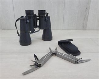 (1) Bushnell Binoculars - 10x50 - no caps  (1) Ozark Trail Multi purpose tool with case and belt loop