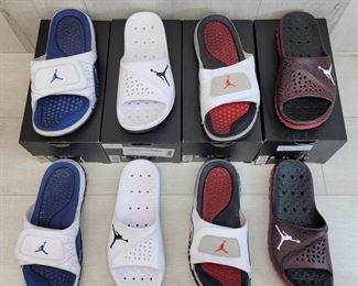 4 pairs - Nike Jordan Hydro/ Super Fly Slides - SIZE 8 pre-owned  Style #820265 107 Hydro XII Retro - White/Blue #842400 021 Super Fly Team Slide - White #532225 104 Hydro IV Retro - White/Red/Black #716985 100 Super Fly Team Slide - White/Black