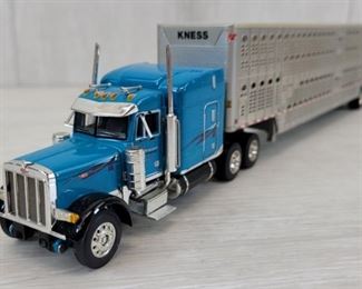 1:64 Diecast Tractor Trailer Cattle Hauler Series II FF Ertl 2009 Promotions  Musical tin semi trailer - doors are meant to swing open & close, but the piece connecting the music box to them needs repair.