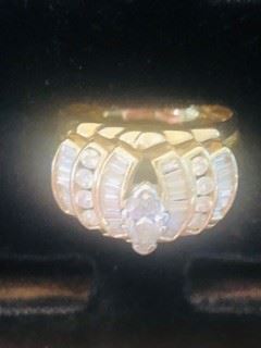 14K Gold 16 grams 2 Ct total weight Diamond Ring . This ring has a 3/4 ct Marquis Cut Center stone 