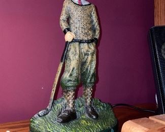 Cast iron door stop (vintage golfer)