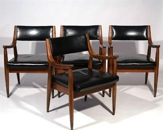 Lot 53 | (4PC) OSLO MID-CENTURY MODERN ARMCHAIRS | Walnut frames with black naugahyde upholstery and brass feet, with Imperial Leather Furniture Co. labels; h. 30-1/2 w. 22-1/2 d. 21-1/2 in.