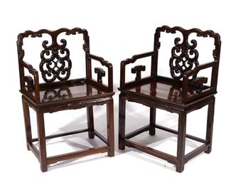Lot 61 | PAIR CARVED ANTIQUE CHINESE ARMCHAIRS | With openwork carved backs; h. 38-1/4 w. 24 d. 18-1/2 in.