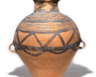 Lot 87 | CHINESE NEOLITHIC POTTERY JAR | East Asia, China, Neolithic Period, Majiayao culture, ca. 3300 to 2000 BCE, buff ceramic body of ovoid shape with double handles decorated with concentric rings and chevron designs; h. 14-1/2 in.