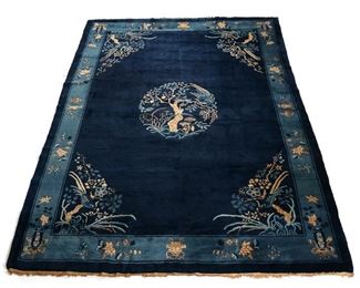 Lot 226 | EARLY 20TH CENTURY CHINESE PEKING CARPET | Having a tree medallion center over a blue field, merino wool
h. 8 ft. 10 in. w. 11 ft. 6 in.