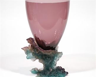 Lot 237 | DAUM FRANCE AMETHYST ART GLASS VASE | Pate de Verre, large amethyst glass vase on a frosted glass base decorated with with two Bacchus faces amongst flowers and grapes, with etched signature on the bottom, "Daum France"
h. 14 dia. 8 in.