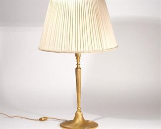 Lot 242 | FRENCH GILT BRONZE TABLE LAMP | Having a fluted column over a swirled base
h. 21 dia. 9 in. (lamp only)
overall: h. 30 x dia. 18 in. (with shade) Accompanied by a conforming shade