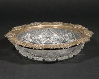 Lot 254 | TIFFANY & CO. SILVER-MOUNTED BRILLIANT PERIOD BOWL | The sterling silver rim with openwork floral motif, stamped "TIFFANY & CO MAKERS" [monogrammed BM]
h. 2-1/2 dia. 11-1/4 in.