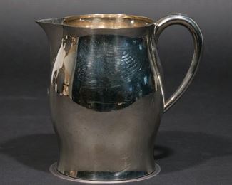 Lot 256 | TIFFANY & CO. STERLING SILVER PITCHER | Open pitcher monogrammed with a "G"; 18 ozt
h. 6-1/2 w. 7-1/2 in.
