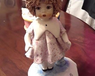 Pottery doll figurine
