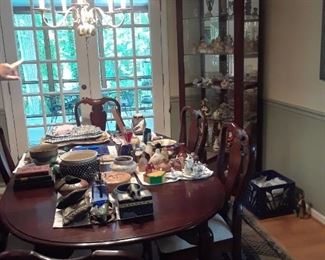 Mahogany display case, lighted with sliding glass door