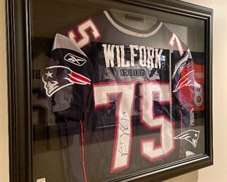Item 41:  Autographed Wilfork jersey with COA - 34.5" x 27.75":  $300