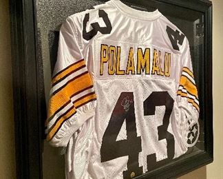 Item 24:  Autographed Polamalu jersey with COA - 34.5" x 27.75":  $350
