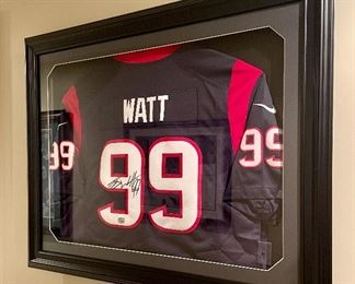 Item 25:  Autographed Watt jersey with COA - 34.5" x 27.75":  $300